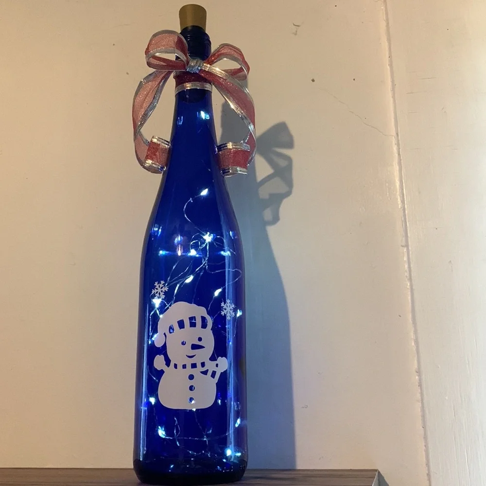 Snowman blue wine bottle lantern